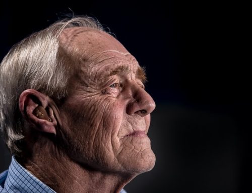 What are hearing aids and how can they benefit people with hearing problems?